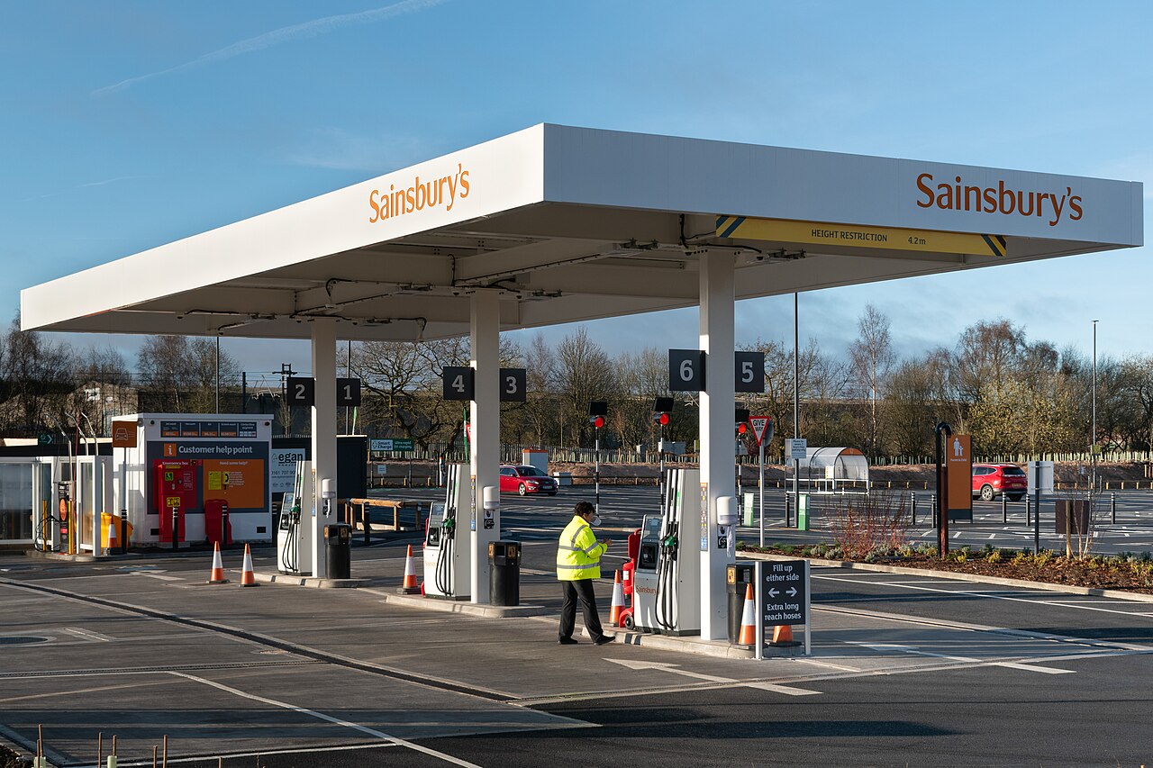 An independent fuel service station forecourt with pumps.
